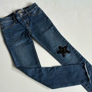 Old Navy Rockstar Jeggings with black sequins star patch.  Girls size 10